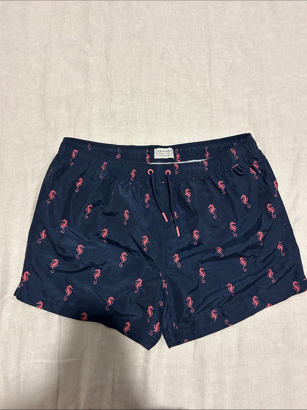Navy Swim Trunks with Pink Seahorse Print